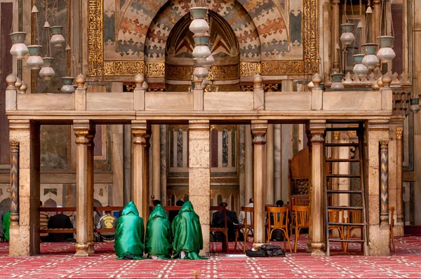 Three females pray in mosque — Stock Photo, Image