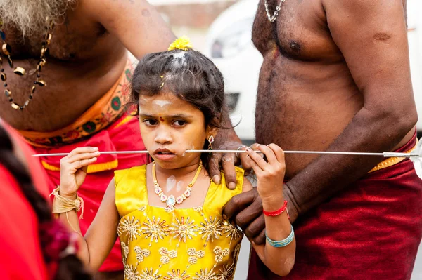 Young girl taking part in Thaipusam festival — Stockfoto