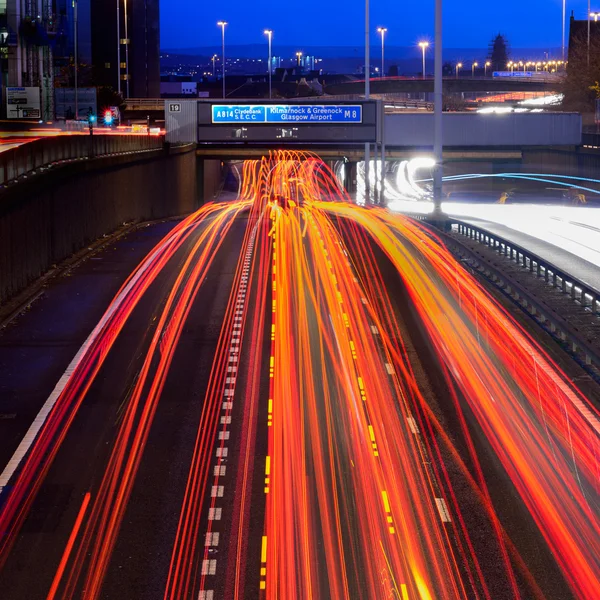 Streaks of coloured light from vehicles — Stock Photo, Image