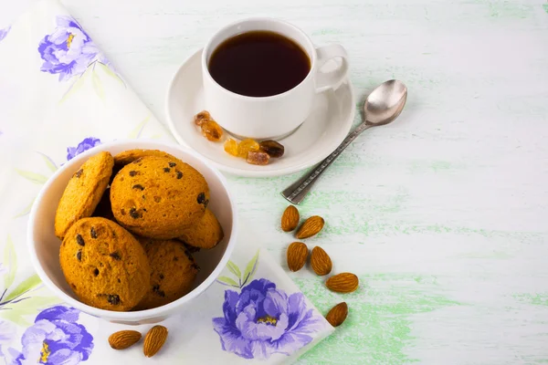 Cookies, almond and cup of tea