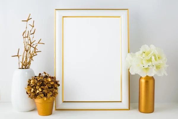 Frame mockup with ivory hydrangea in the  golden vase, white vas