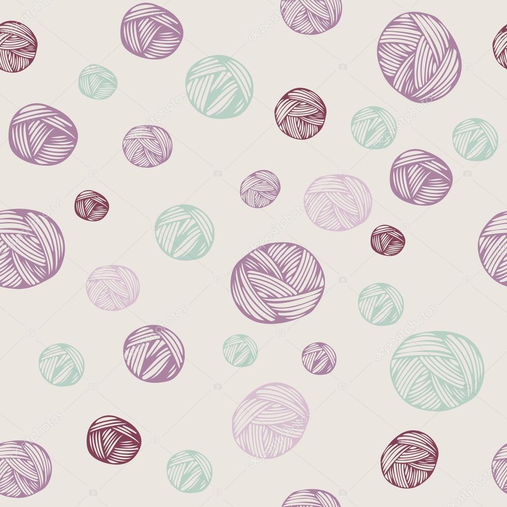 Hand drawn balls of yarn seamless pattern