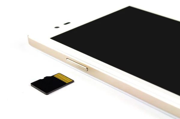 Smart phone e micro sd card su sfondo bianco — Foto Stock