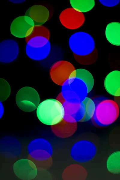 Luces de fondo abstractas de Navidad coloridas, desenfocadas, borrosas, bokeh, reflexión — Foto de Stock