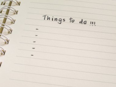 El üstünde açılan defter yazma