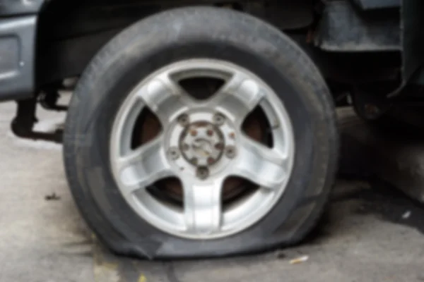 Damaged flat tire — Stock Photo, Image