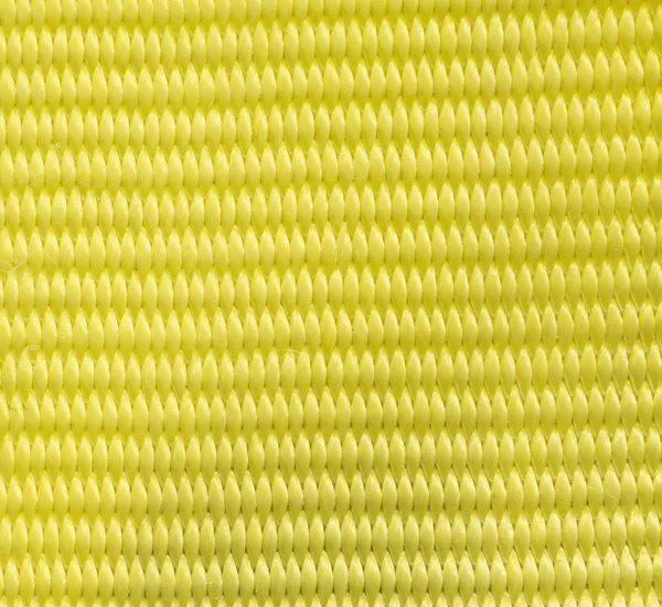 Texto tecido amarelo — Fotografia de Stock
