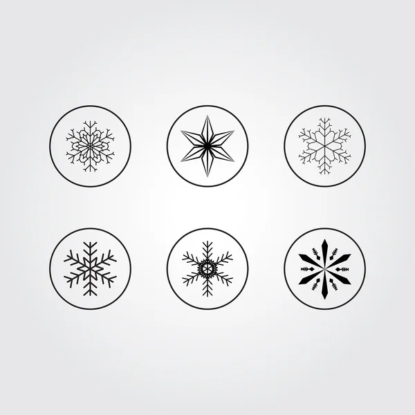 Schneeflockensymbole für den Winter — Stockvektor