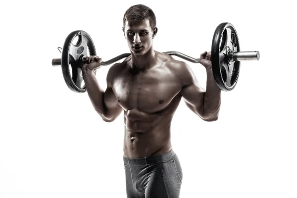 Strong man exercising fitness body building exercises with a barbell — Stock fotografie