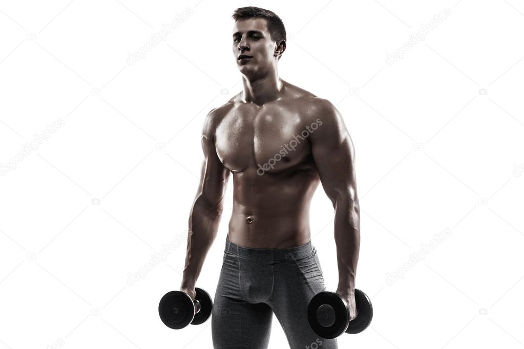 Muscular man showing perfect body with dumbbells, isolated on white