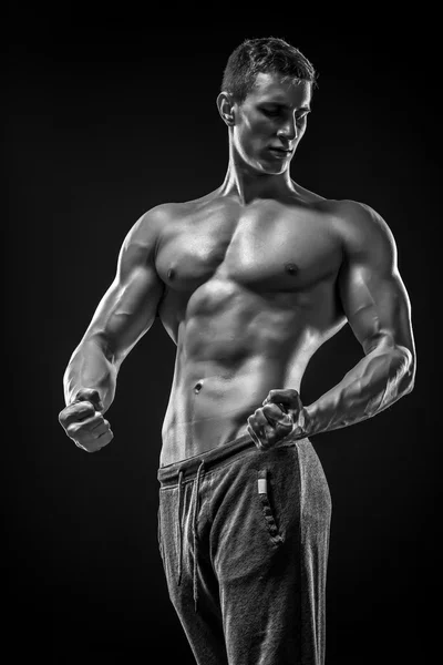 裸の胴体とポーズ非常に筋肉質の男のイメージ — ストック写真