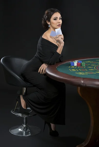 Sexy woman with poker cards and chips — Stock Photo, Image