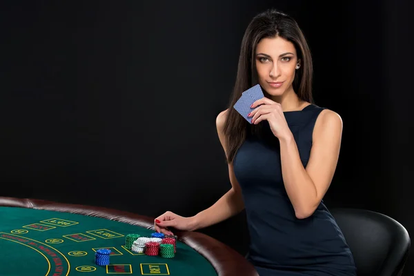 Sexy woman with poker cards and chips — Stock Photo, Image