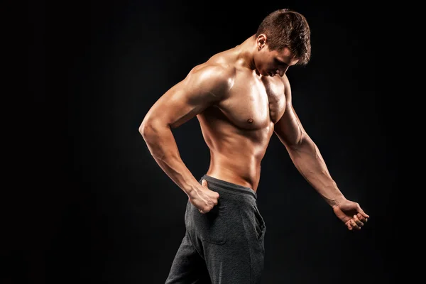 Image of very muscular man posing with naked torso — Stock Photo, Image