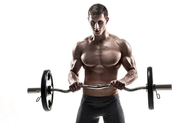 Young handsome man with naked torso and barbell — ストック写真