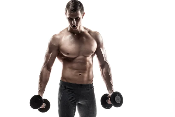 Hombre musculoso mostrando un cuerpo perfecto con mancuernas, aislado en blanco —  Fotos de Stock