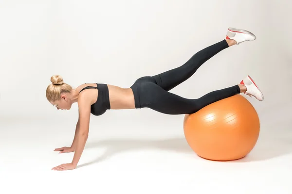 Young woman training with fitball — Stock Photo, Image