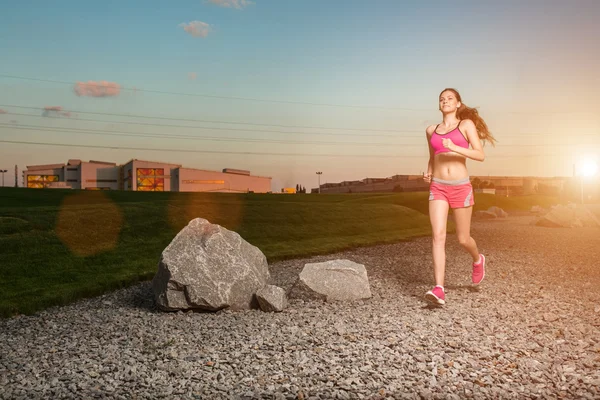 Running woman. Runner jogging in sunny nature. — Stock Photo, Image