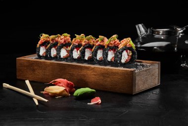 California black roll with eel, salmon, shrimp and tobiko