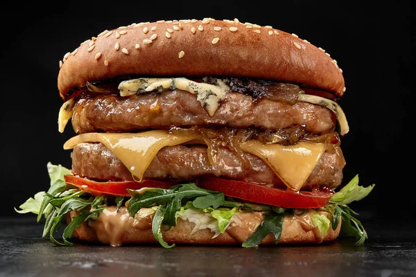 Double burger with two cheeses, caramelized onion — Stockfoto