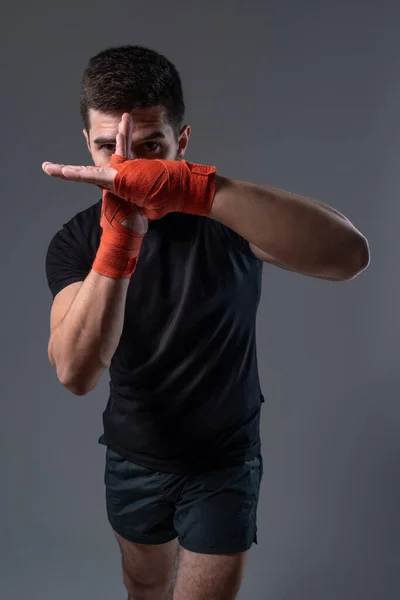 Martial arts fighter with palms folded in cross target — Foto de Stock