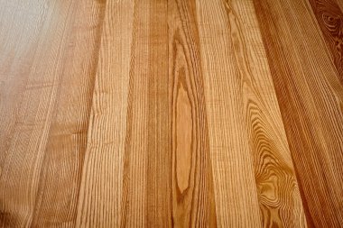 Natural wood veneered board with light brown texture