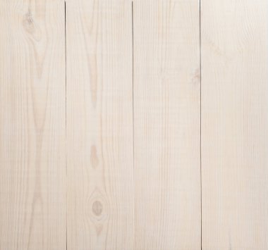 Pürüzsüz yüzlü beyaz tahta kaplamalı doğal bir arka plan.