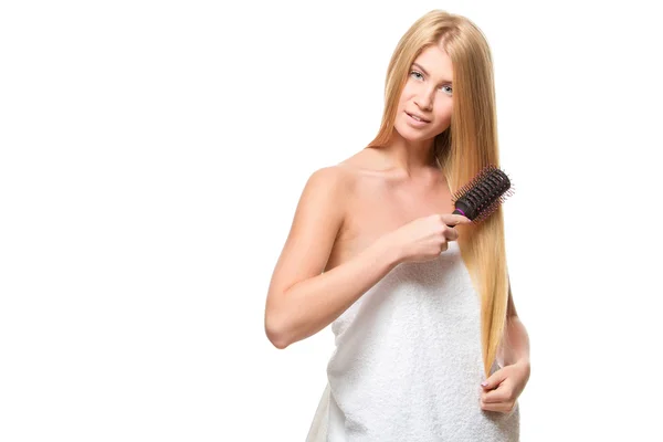 Young attractive blond woman with blue eyes in a towel — 스톡 사진