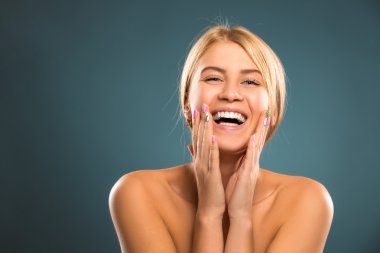 Portrait beautiful blond woman with long hair and blue eyes