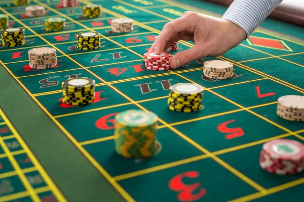 Picture of a green table and betting with chips. — Stock Photo, Image