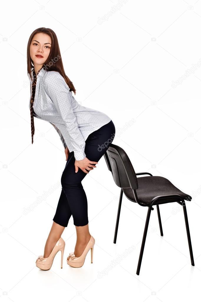 Sexy business woman in a blouse and trousers Stock Photo by ©aurastudia  110728670