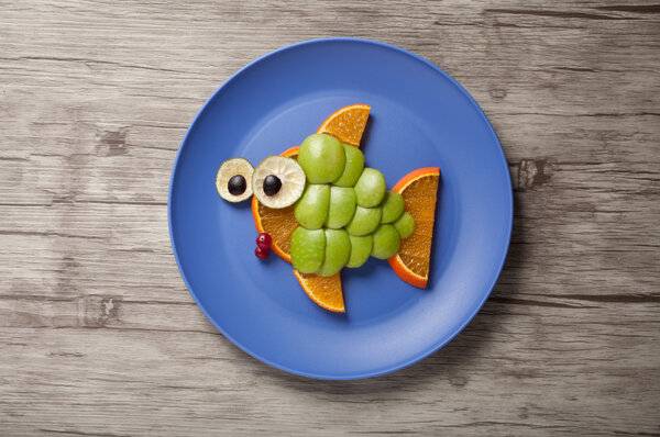 Fish made of green apple