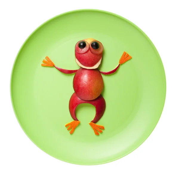 Żaba z czerwonym jabłkiem — Zdjęcie stockowe