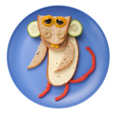 Komik maymun ekmek, peynir ve sebze 