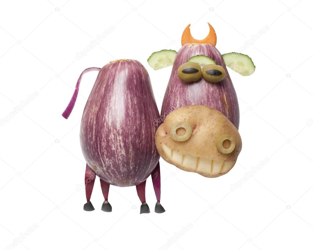 Funny cow made of eggplant and potato
