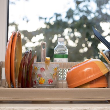 dishes on the windowsill clipart