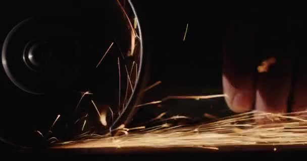 Closeup shot: man handles metal with a hand-held electro instrument. Slow motion video — Stock Video