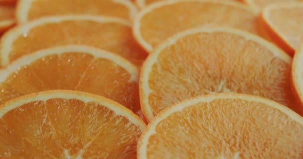 Oppervlakte van schijfjes rijp oranje — Stockvideo