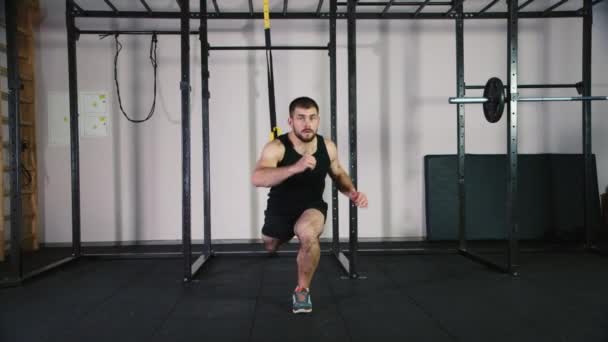 Athletic man doing exercise for the workout legs — Stock Video