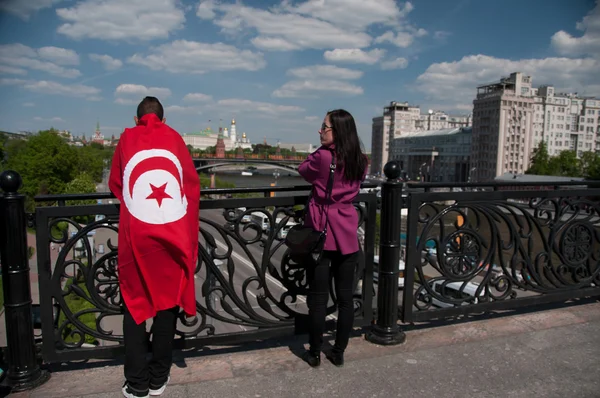 People dressed in national flag of Tunis — Stock Photo, Image
