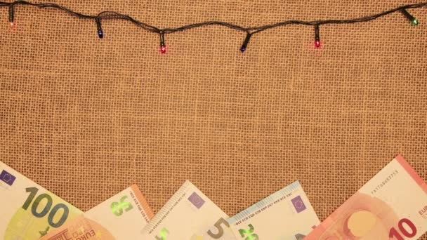 Ramka na napisy świąteczne z girlandą i euro. — Wideo stockowe