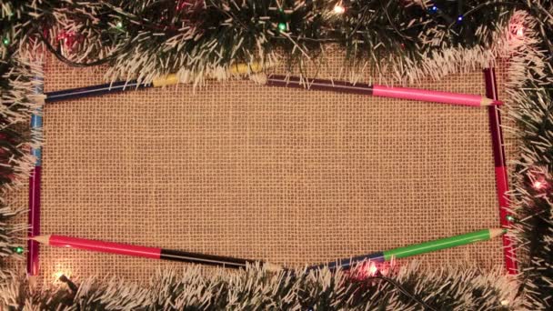 Рождественская рамка с цветными карандашами. — стоковое видео