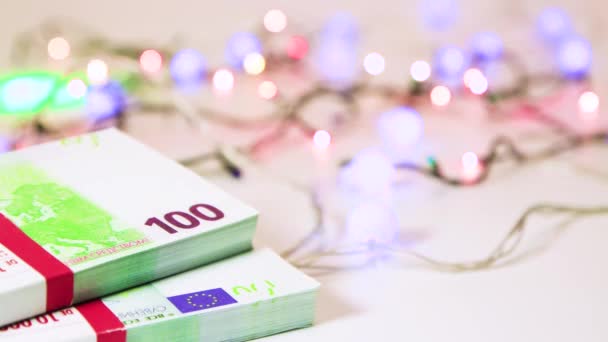 Euro bills, bundles of money with bokeh back. — Stock Video