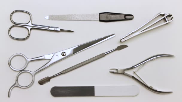 Extractor, scissors, clipper, nippers, nail files disappear by animation. — Stockvideo