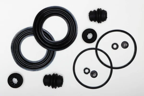 Rubber gaskets, rings, oil seals, machine repair parts. Royalty Free Stock Photos