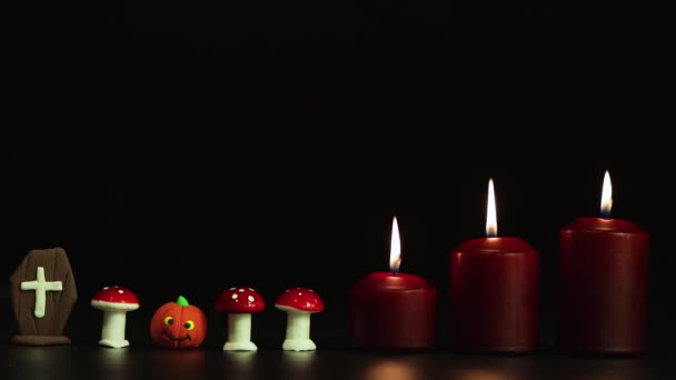 Tombstone, toadstools with pumpkin and candles, Halloween horror story. — Stock Video