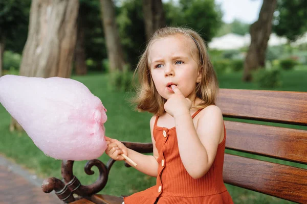 Beautiful Little Girl Eating Pink Cotton Candy Park — Stock Photo, Image