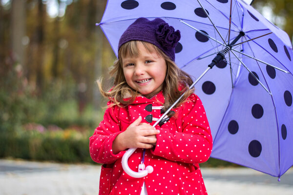 Little girl with umbrella