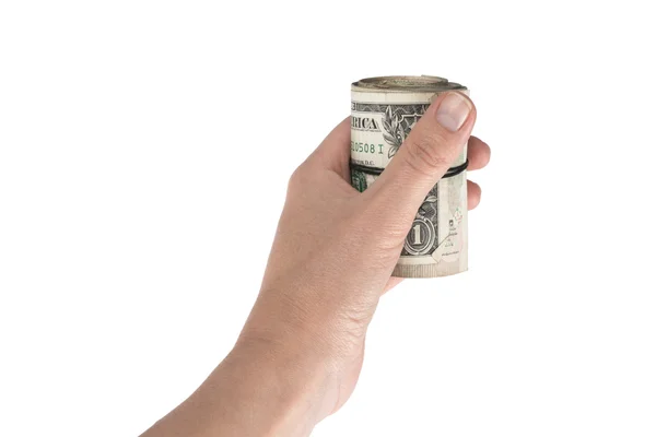 Rollo retorcido de dólares en la mano — Foto de Stock