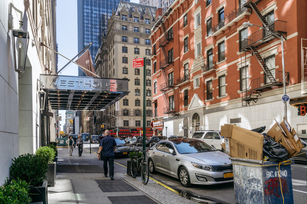 New York, USA - September 20, 2015: People walking on the street of New York.